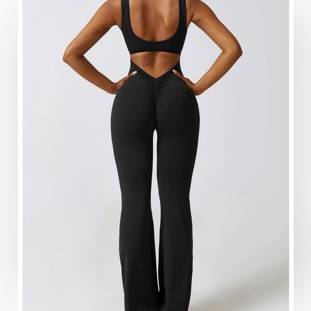 Trendy,  Backless Jumpsuit  Bodysuit with Flared Legs in Size Sm in Black
